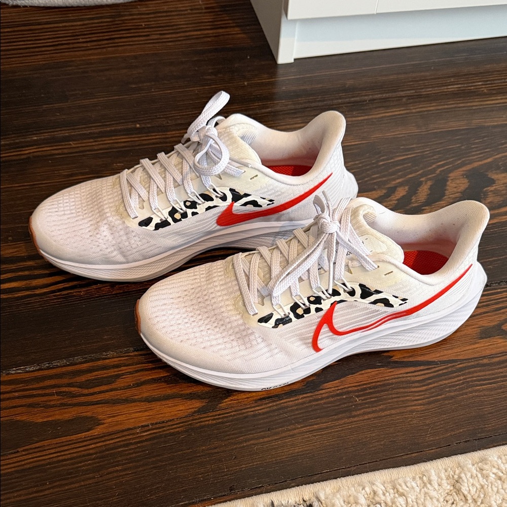 Woman’s 7.5 Leopard and Orange Nike Sneakers